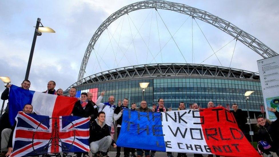 Fans arrive early at Wembley Stadium ahead of the friendly game