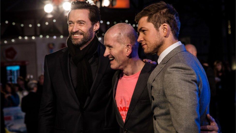 Hugh Jackman, Eddie Edwards and Taron Egerton at the UK premiere