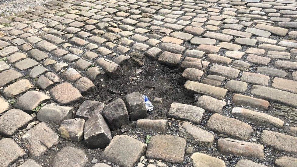 Part of the damaged cobbles