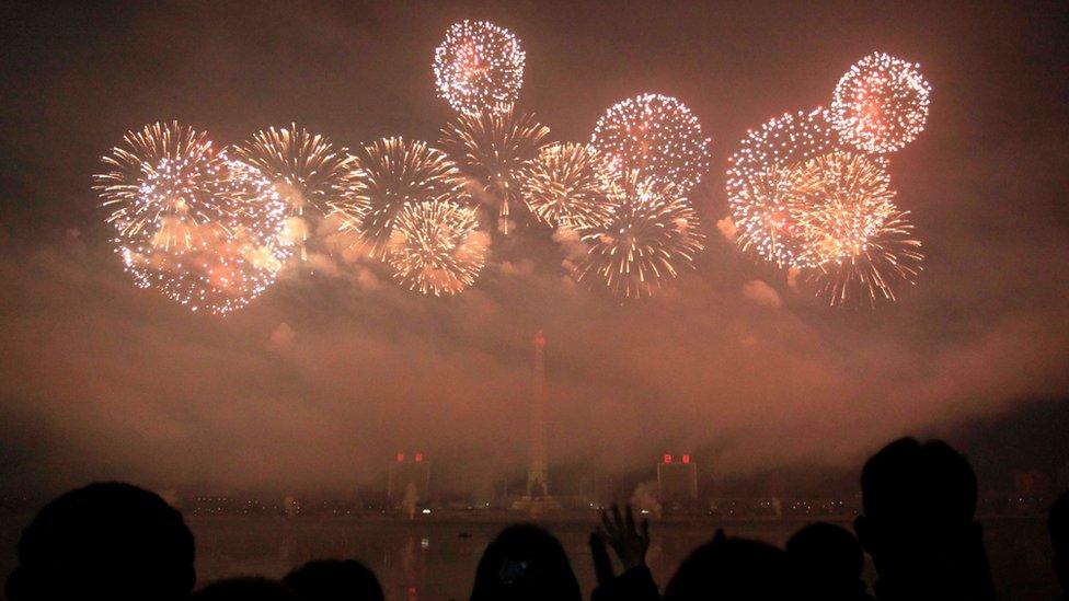 North Koreans gather to watch a New Year"s fireworks display at the Kim Il Sung Square in Pyongyang, North Korea, on Sunday, Jan. 1, 2017
