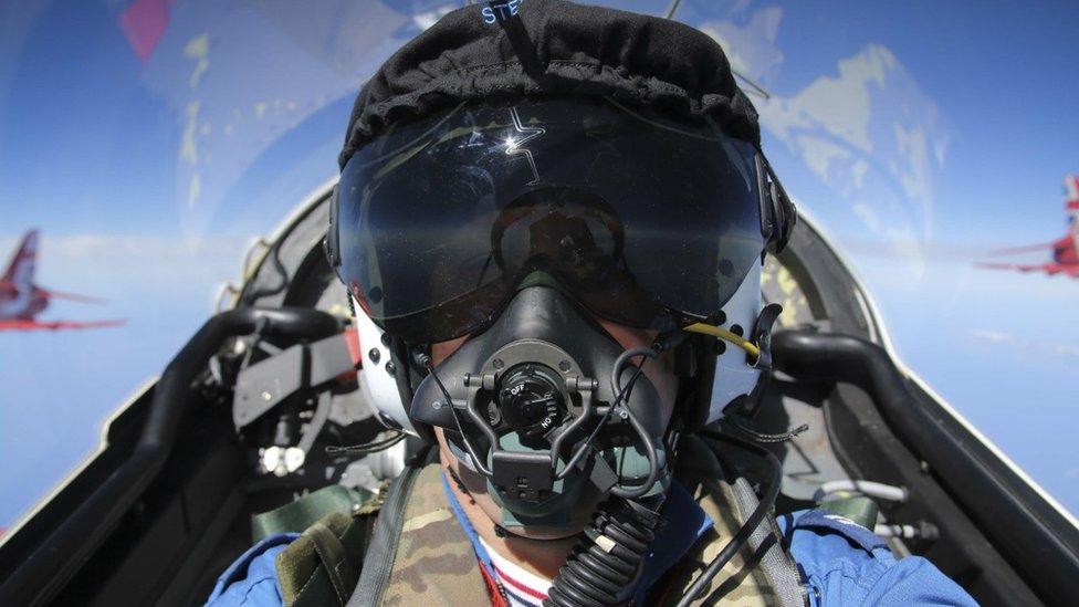 Pilot in cockpit