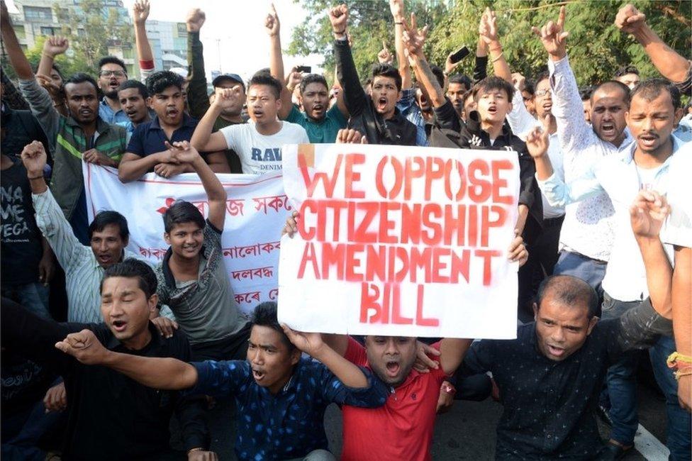 Students shout slogans during a protest against the Citizenship Amendment Bill (CAB) in Guwahati, Assam, India, 11 December 2019