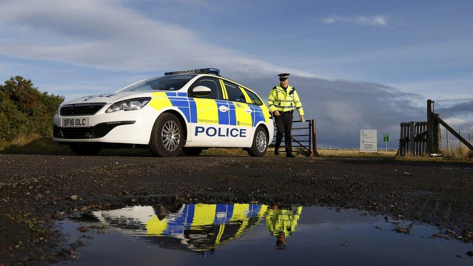 Police at entrance to RAF Tain