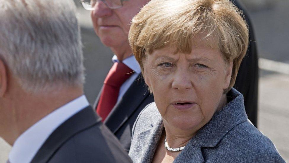 German Chancellor Angela Merkel arrives in Heidenau, eastern Germany