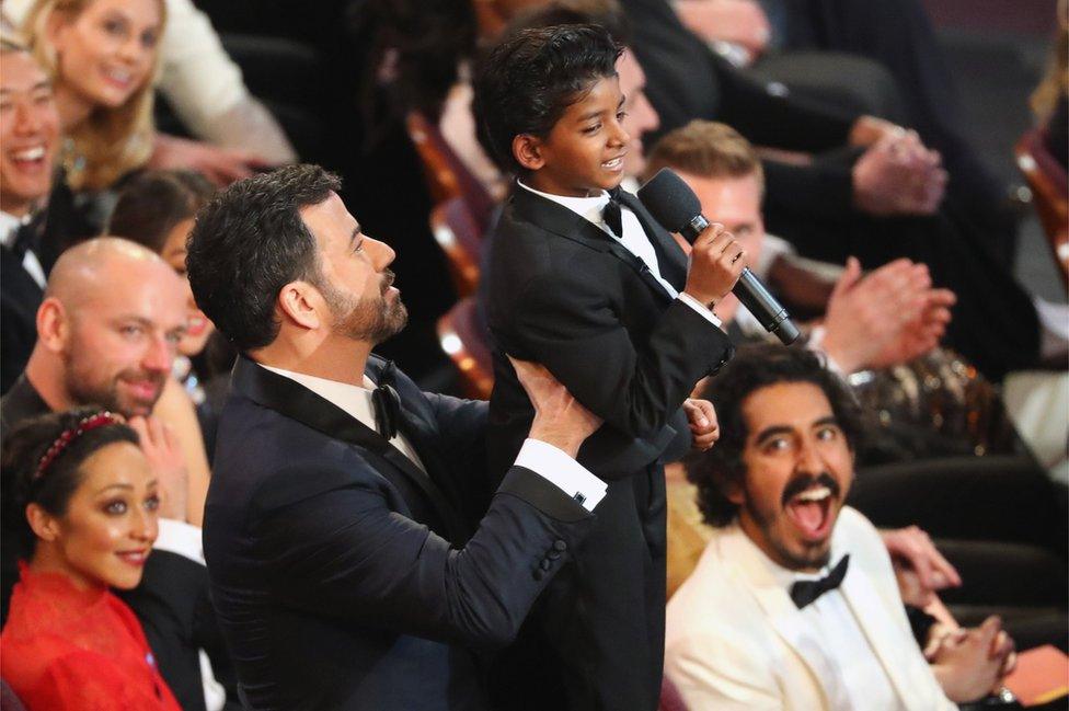 Dev Patel watches Jimmy Kimmel lift Sunny Pawar