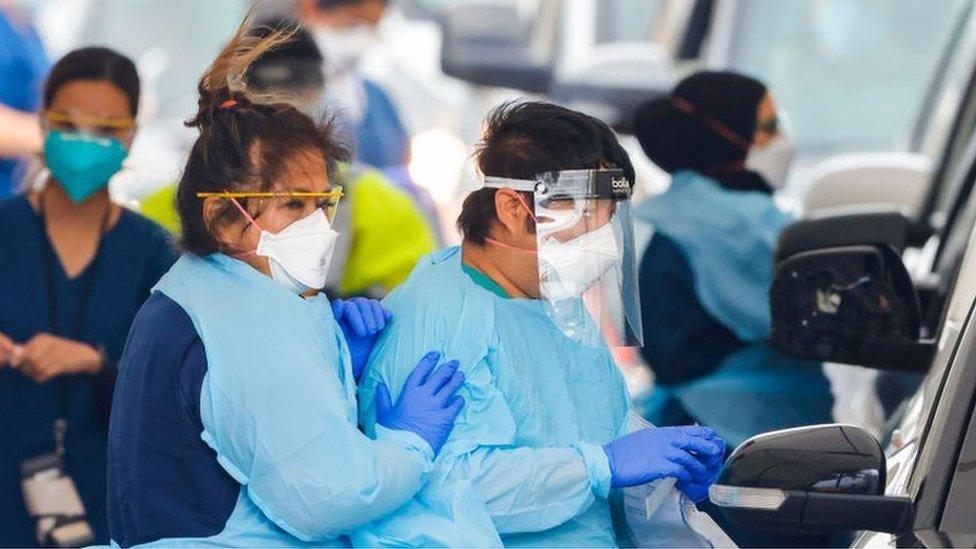 Health workers conduct COVID-19 tests at the Bondi Beach testing clinic on December 28, 2021 in Sydney, Australia