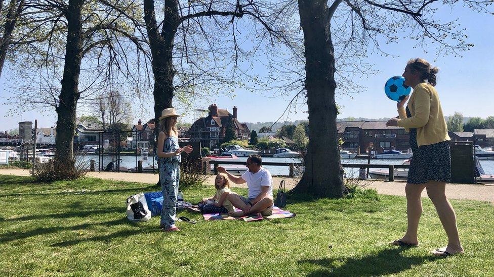 A family playing by the river in Marlow, Buckingham