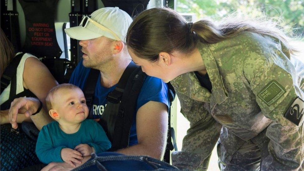 A family are evacuated from Kaikoura, New Zealand (15 Nov 2016)