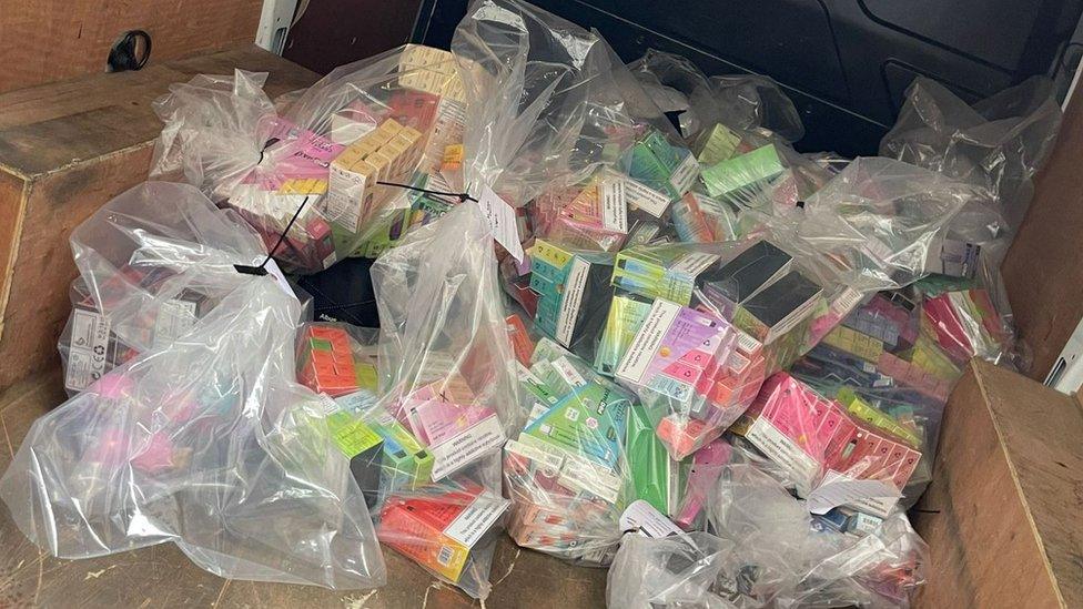 Seized vapes in bags in back of van