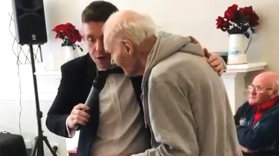 Frankie Mack singing in a care home in Edinburgh