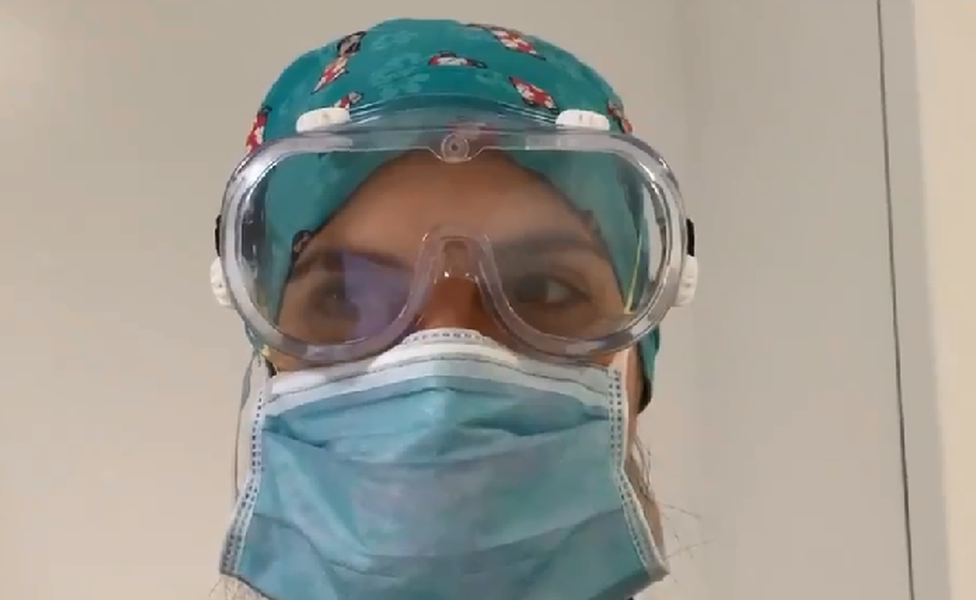 Image from Twitter of doctor in poorly-fitting PPE