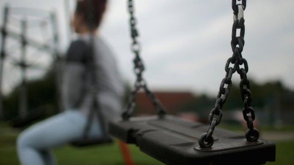 A child on a swing