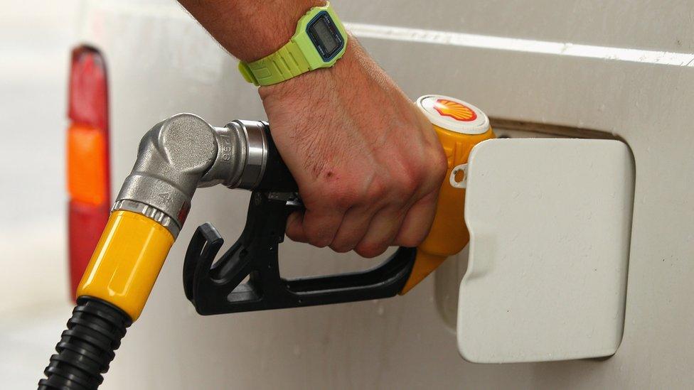 Man filling his car with petrol