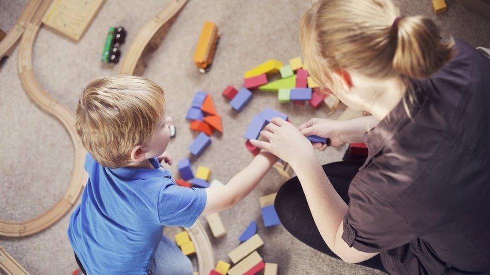 Child playing with toys