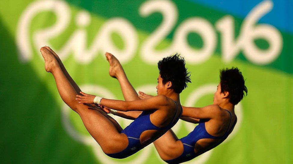 Kuk Hyang Kim and Mi Rae Kim of Democratic People's Republic of Korea compete in the Women's Diving Synchronised