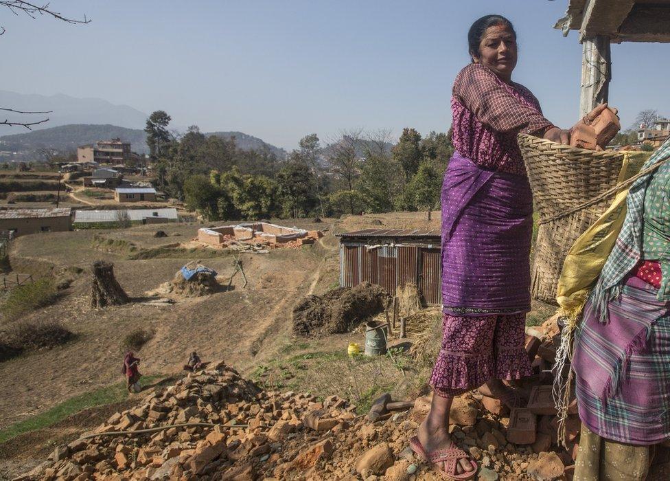 Uma's mother with bricks