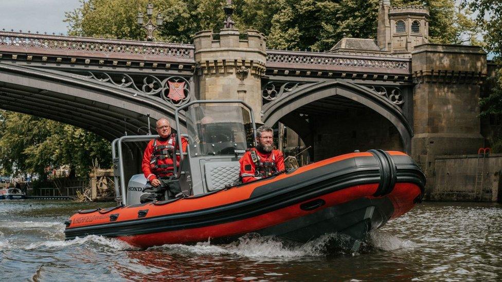 Crew members on the River Ouse in York