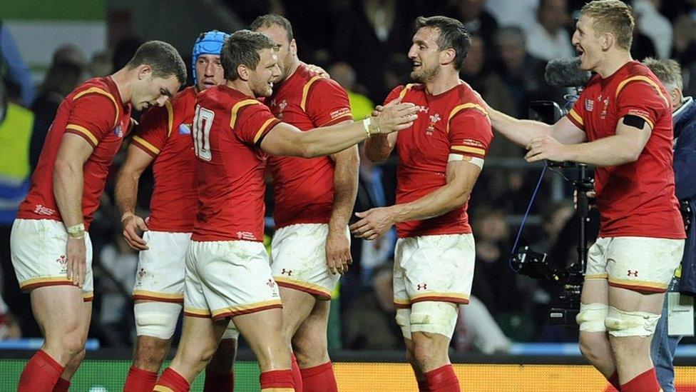 Wales players celebrate after win