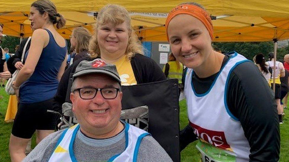 Graham Taylor with wife Lindsey and fellow runner and nurse Amy Brown