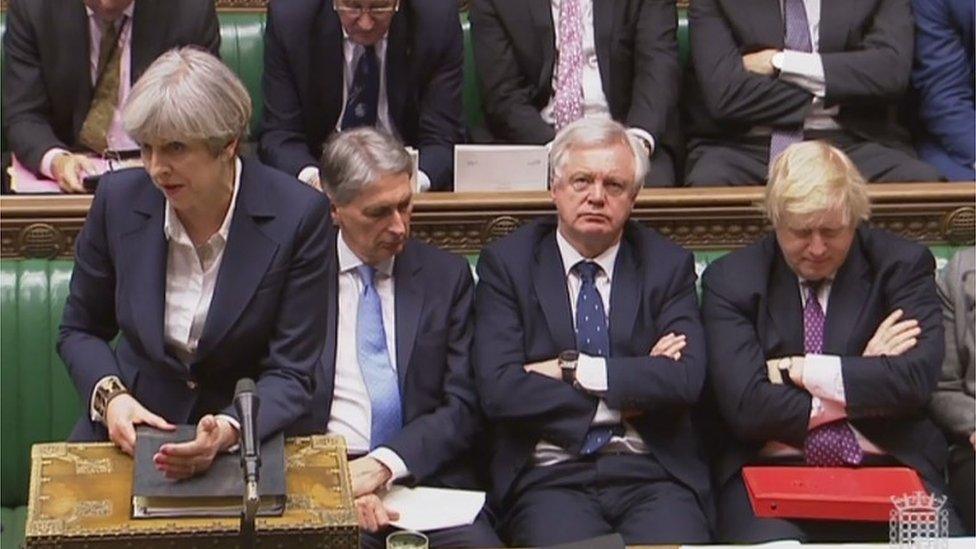 Theresa May in parliament with Phil Hammond, David Davies and Boris Johnson