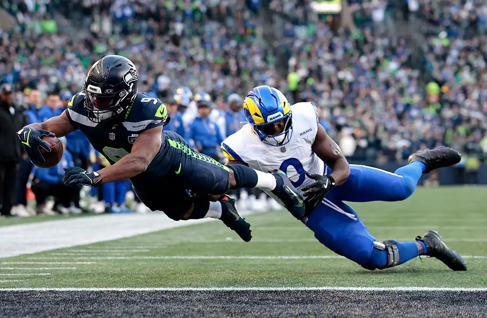 Seattle Seahawks running back Kenneth Walker III scores a first-quarter touchdown in the NFC Championship game against the Los Angeles Rams at Lumen Field. Photo by Ronald Martinez