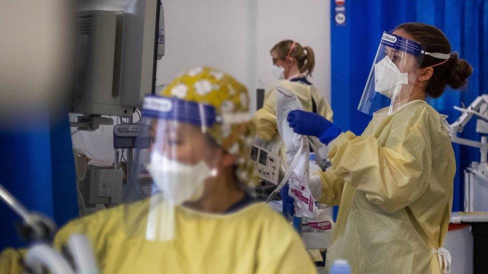 Nurses work on patients in the Intensive Care Unit (ICU) in St George"s Hospital in Tooting in early January 2021