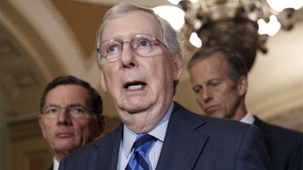 Mitch McConnell addressing the press in the US Capitol