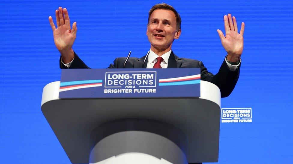 Chancellor Jeremy Hunt gives a speech at the Conservative Party Conference