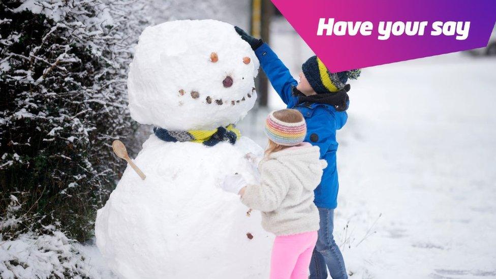 children-building-snowman.