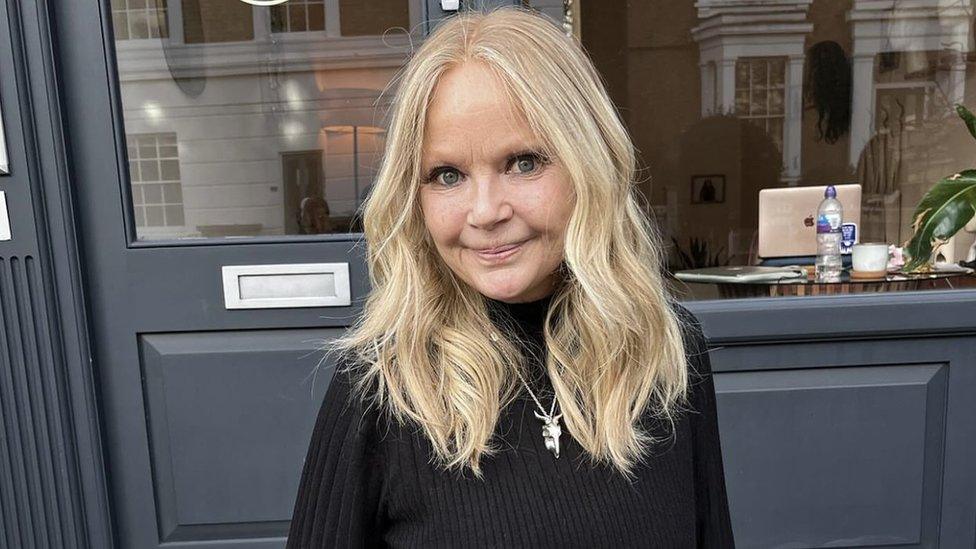 Gail Porter, with her new wig, smiling at the camera