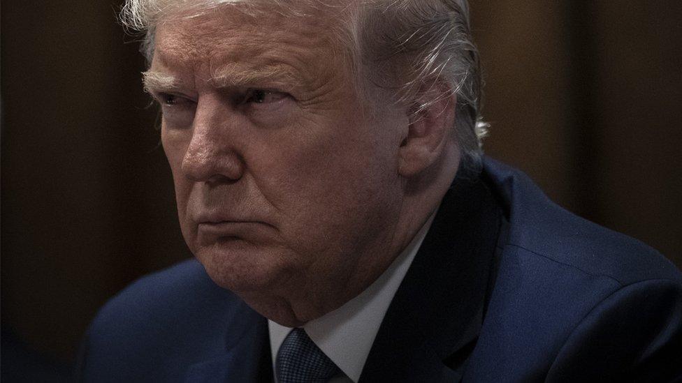 President Donald Trump listens during a meeting about the Governors Initiative on Regulatory Innovation