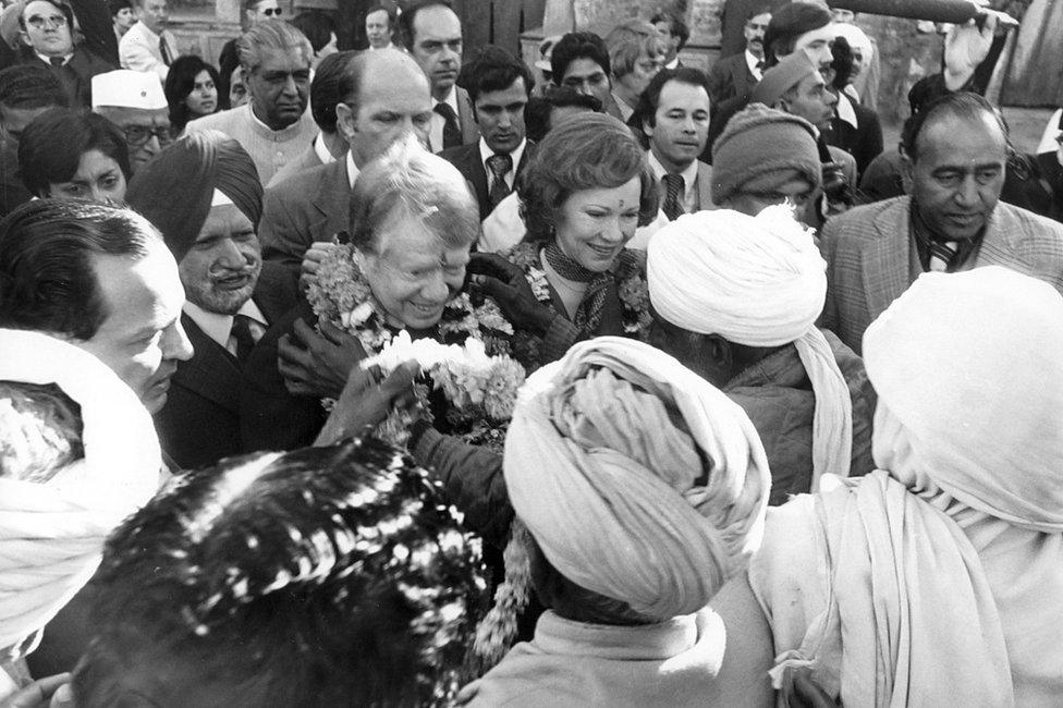 Jimmy Carter being greeted by villagers of 'Carterpuri'