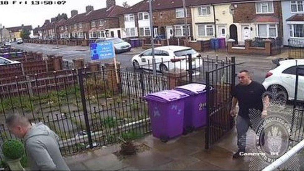 Colin Jones and Lee Murray in a street of terraced houses