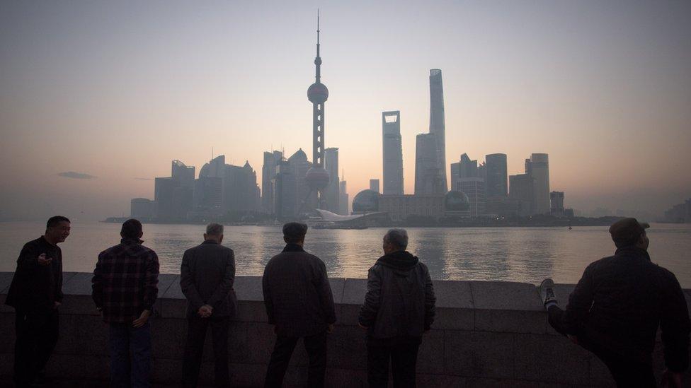 Elderly men on the waterfront in Shanghai