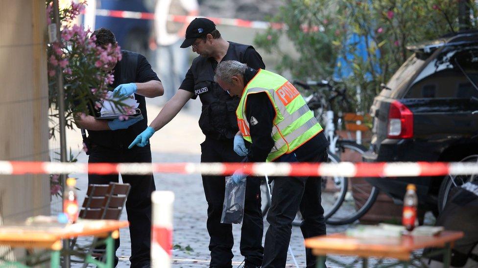 investigators at the scene of the Ansbach bomb on 24 July 2016