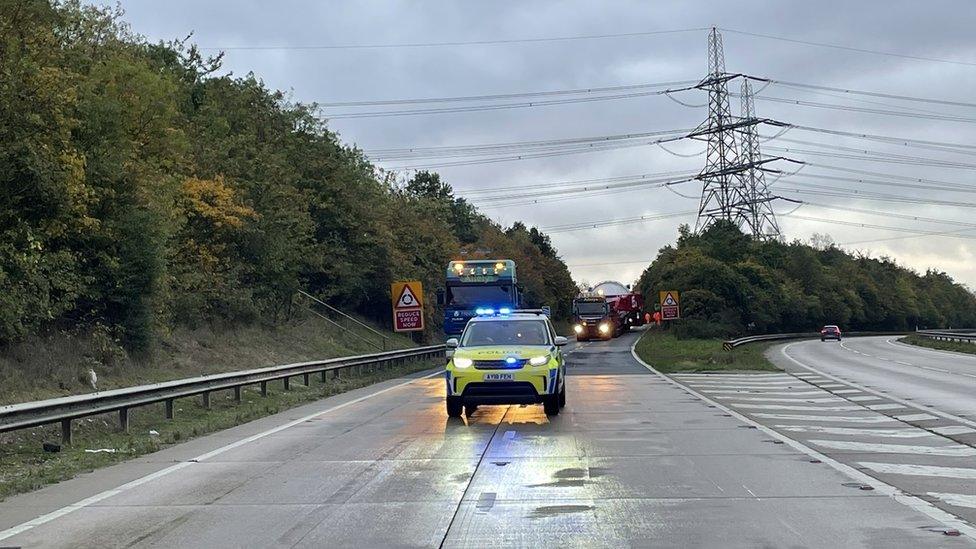 Police in front of lorry