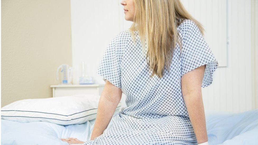 Woman in doctor's office for check up