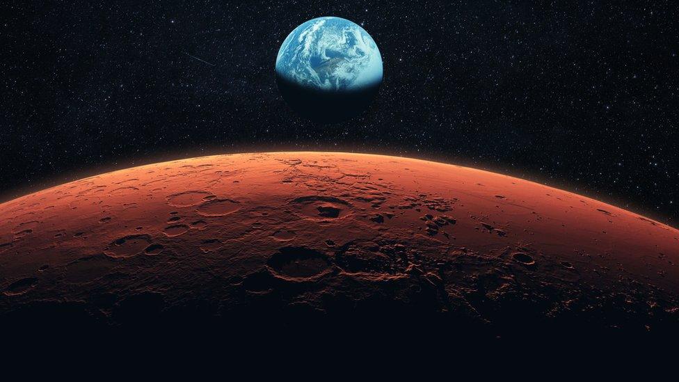 Mars with Earth in background