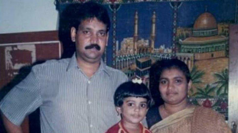 Young Mansiya with her parents