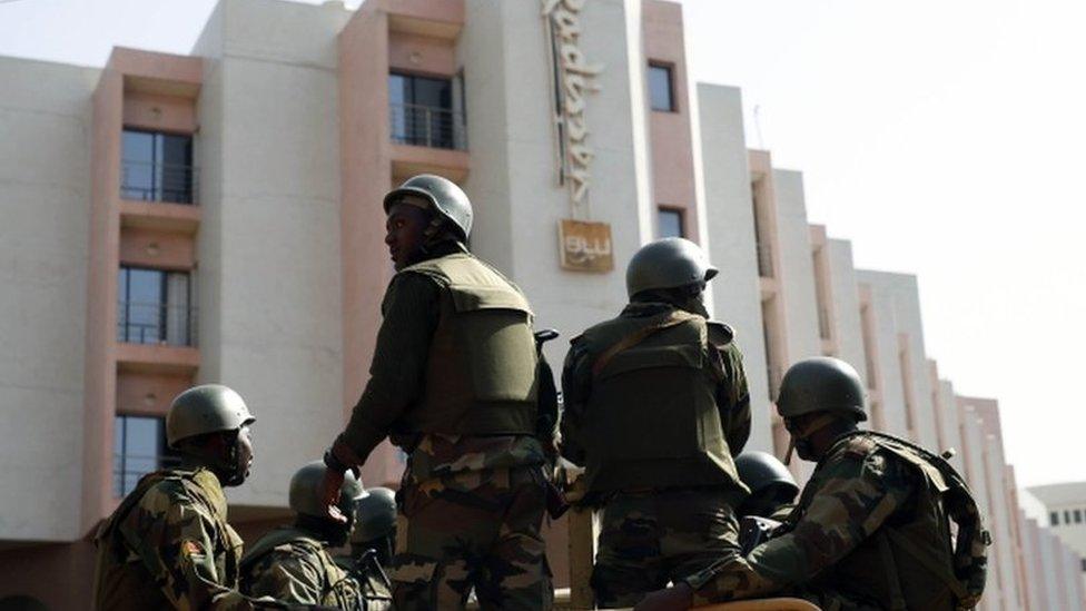 Soldiers from the presidential patrol outside the Radisson Blu hotel in Bamako, Mali, Saturday, Nov. 21, 2015