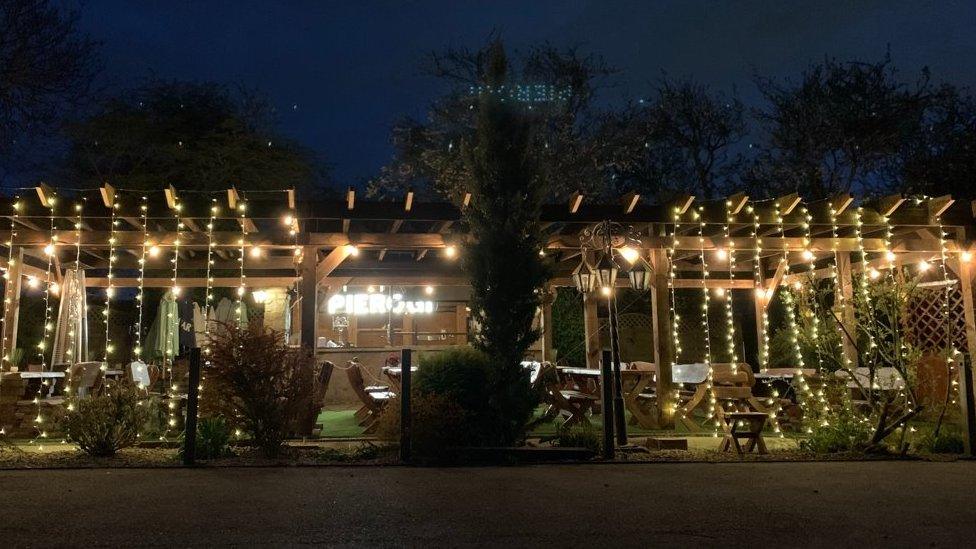 Pergola in pub garden