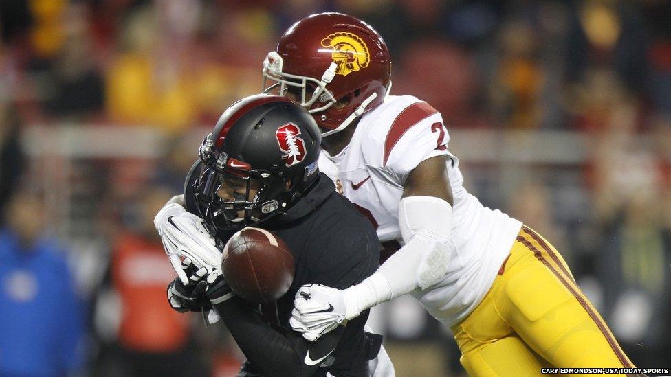 Stanford Cardinal wide receiver Michael Rector drops a pass while being covered by Southern California Trojans cornerback Adoree Jackson, 5 December 2015