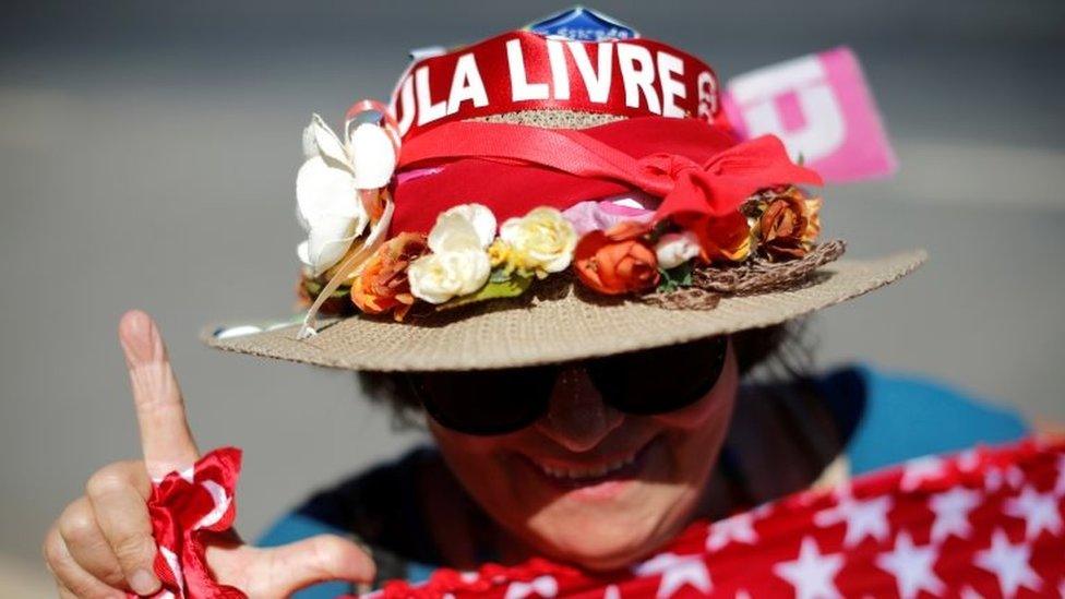 A supporter of Brazil's former President Luiz Inácio Lula da Silva attends a protest against the Brazil's Justice Minister Sergio Moro in front the Justice Ministry headquarters in Brasilia, Brazil June 10, 2019