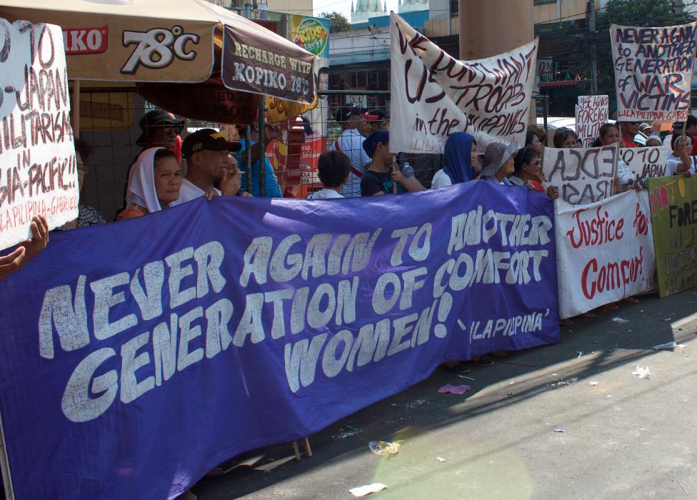 Survivors calling for justice at a demonstration