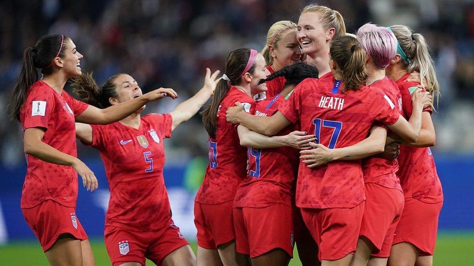 US women's team hugs