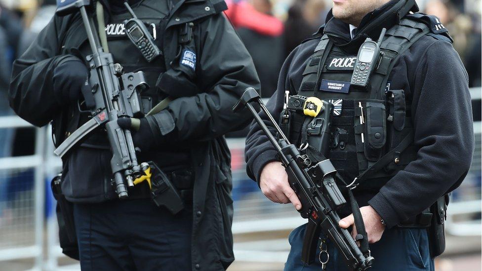 Armed police officers