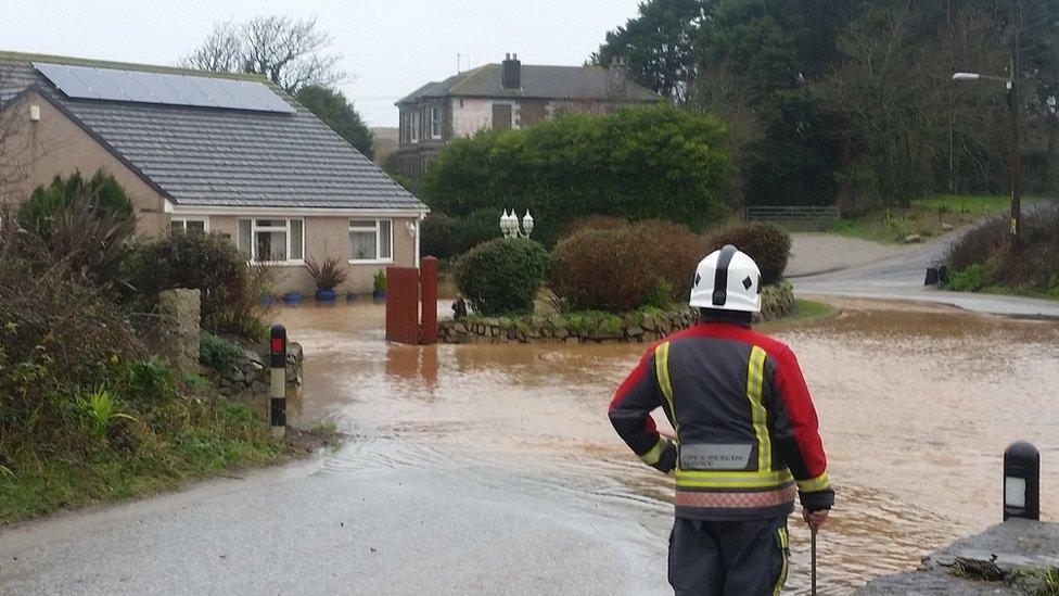 Flooding outside a house in Hayle, Cornwall