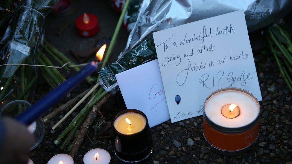 Fans leave floral tributes outside George Michael's home in north London