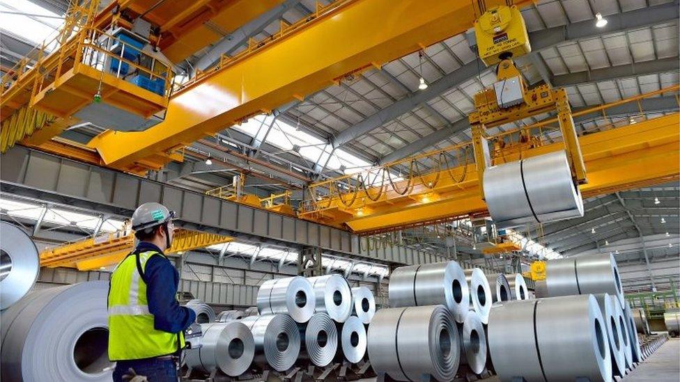 This handout photo taken on September 4, 2013 and released on June 05, 2018 by the press office of Ternium Industrial Center, shows a worker at the picking line at the industrial plant in Pesqueria, Nuevo Leon state, Mexico.