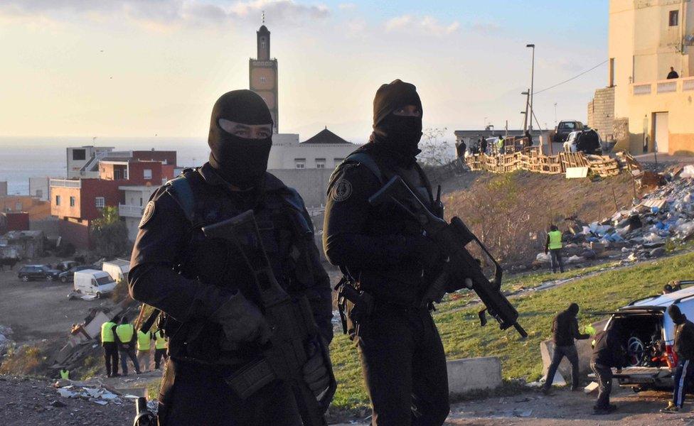 Two Spanish armed policemen wearing balaclavas in Ceuta, North Africa - Friday 13 January 2017
